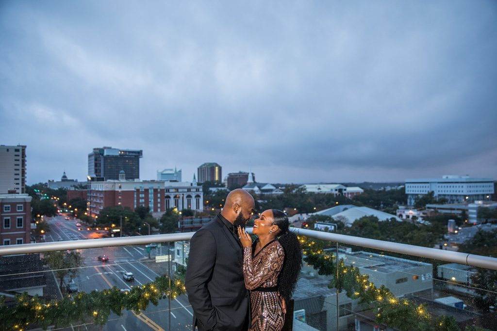couple on balcony at level 8 lounge at Hotel Duval